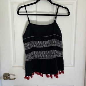 Cute black and white tank with red tassels at the bottom! a.n.a brand!